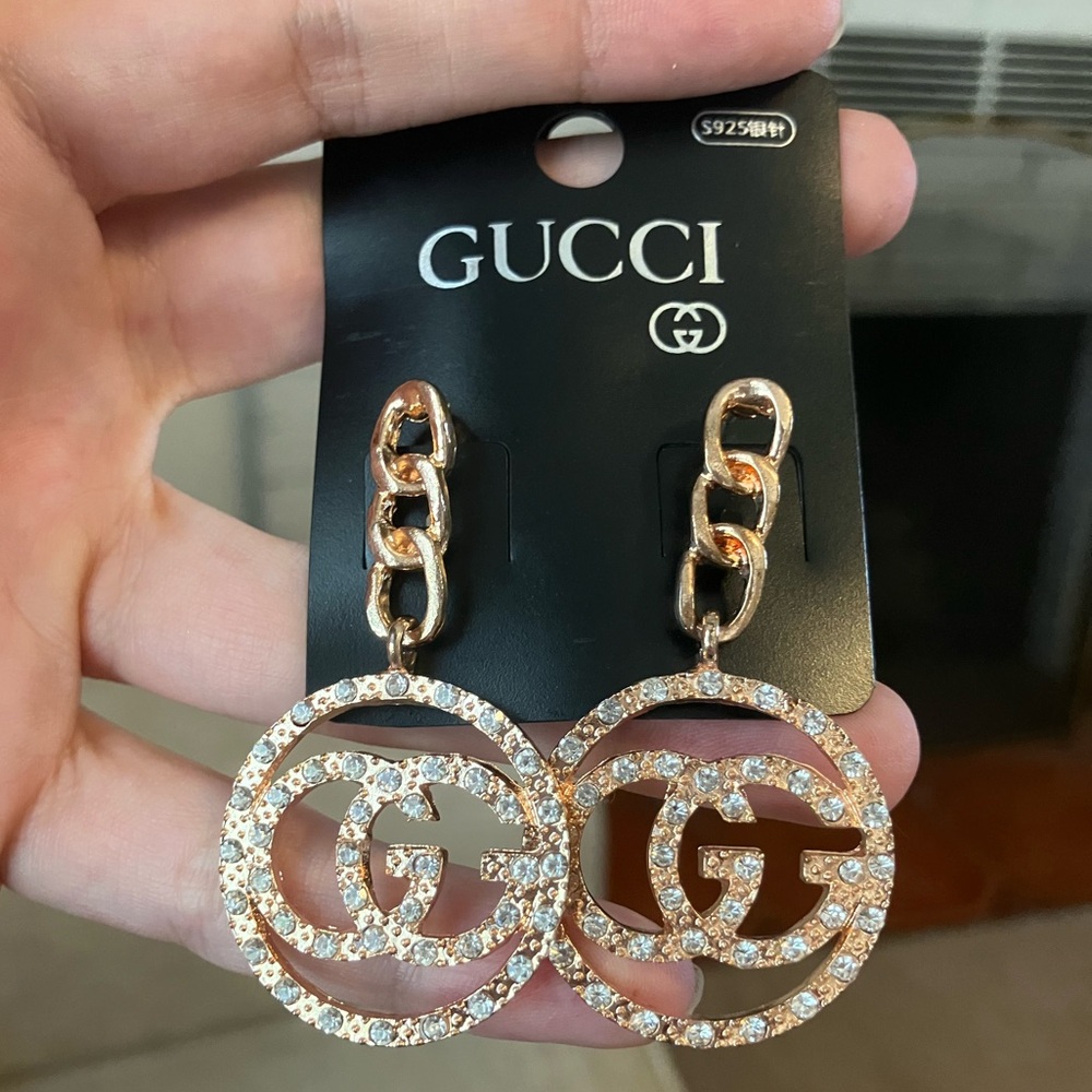 Gg gold and rhinestone dangle fashion earrings